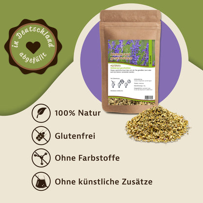 Beutel mynatura Helmkraut geschnitten neben einem Haufen getrocknetem helmkraut, Symbole für 100% Natur, glutenfrei, ohne Farbstoffe und künstliche Zusätze.