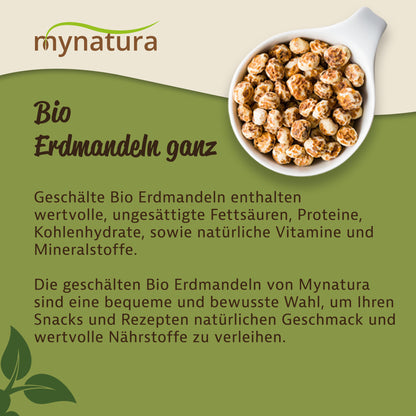 Schale mit geschälten erdmandeln ganz auf grünem Hintergrund, geeignet als ballaststoffreiche nüsse fürs müsli oder zum backen