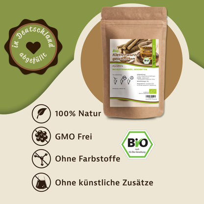 Beutel Klettenwurzel geschnitten 100g vor grünem Hintergrund, daneben Symbole für natürliche Qualität und Bio-Zertifizierung.