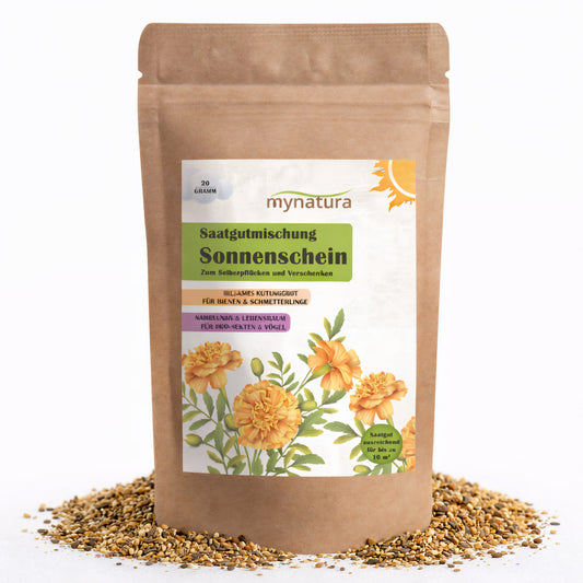 Vorderseite der Mynatura Saatgutmischung Sonnenschein im braunen Beutel mit Ringelblumen-Illustration und verstreuten Pflanzensamen, geeignet für Garten und Balkon.